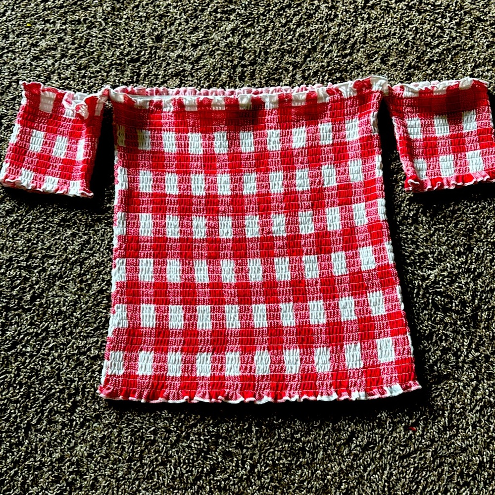 Off shoulder checkered print blouse.